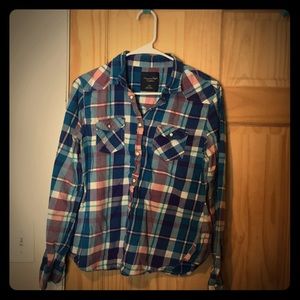 Plaid flannel shirt.